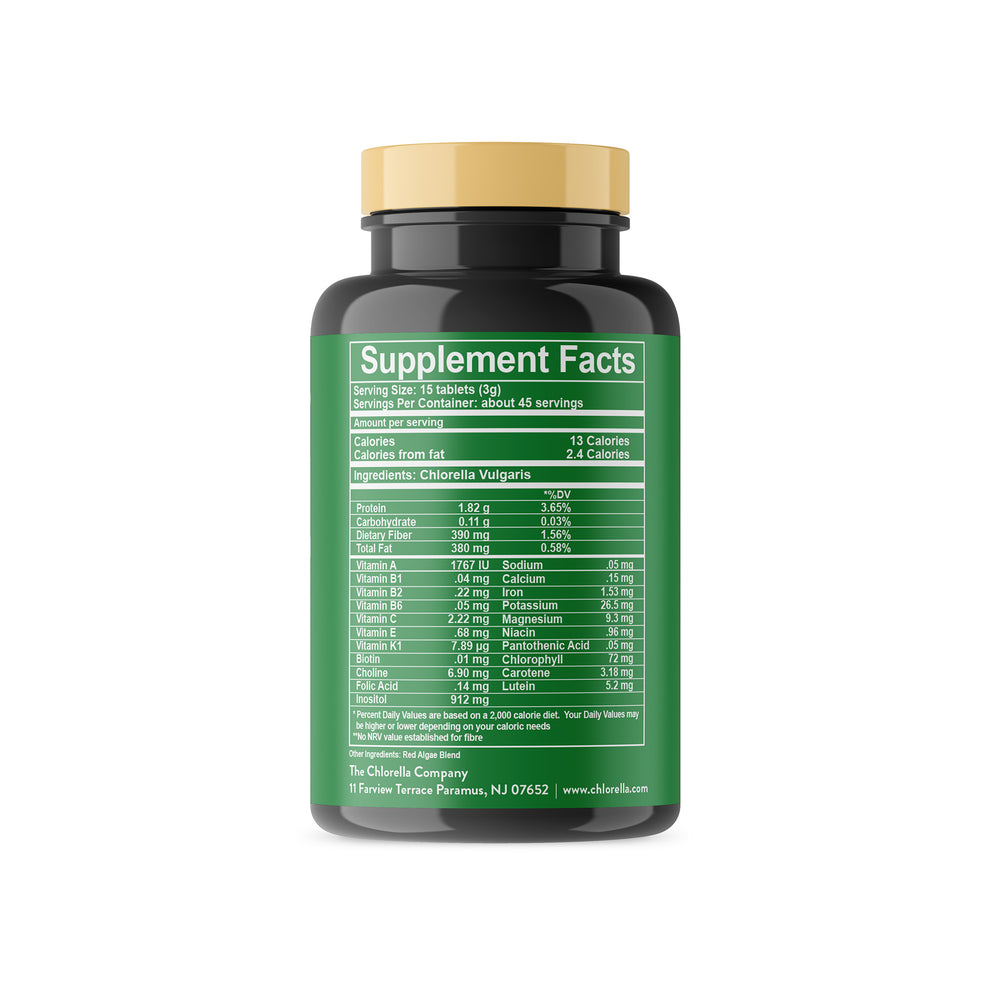 front view of fermented chlorella tablets in a bottle from The Chlorella Company on a white background